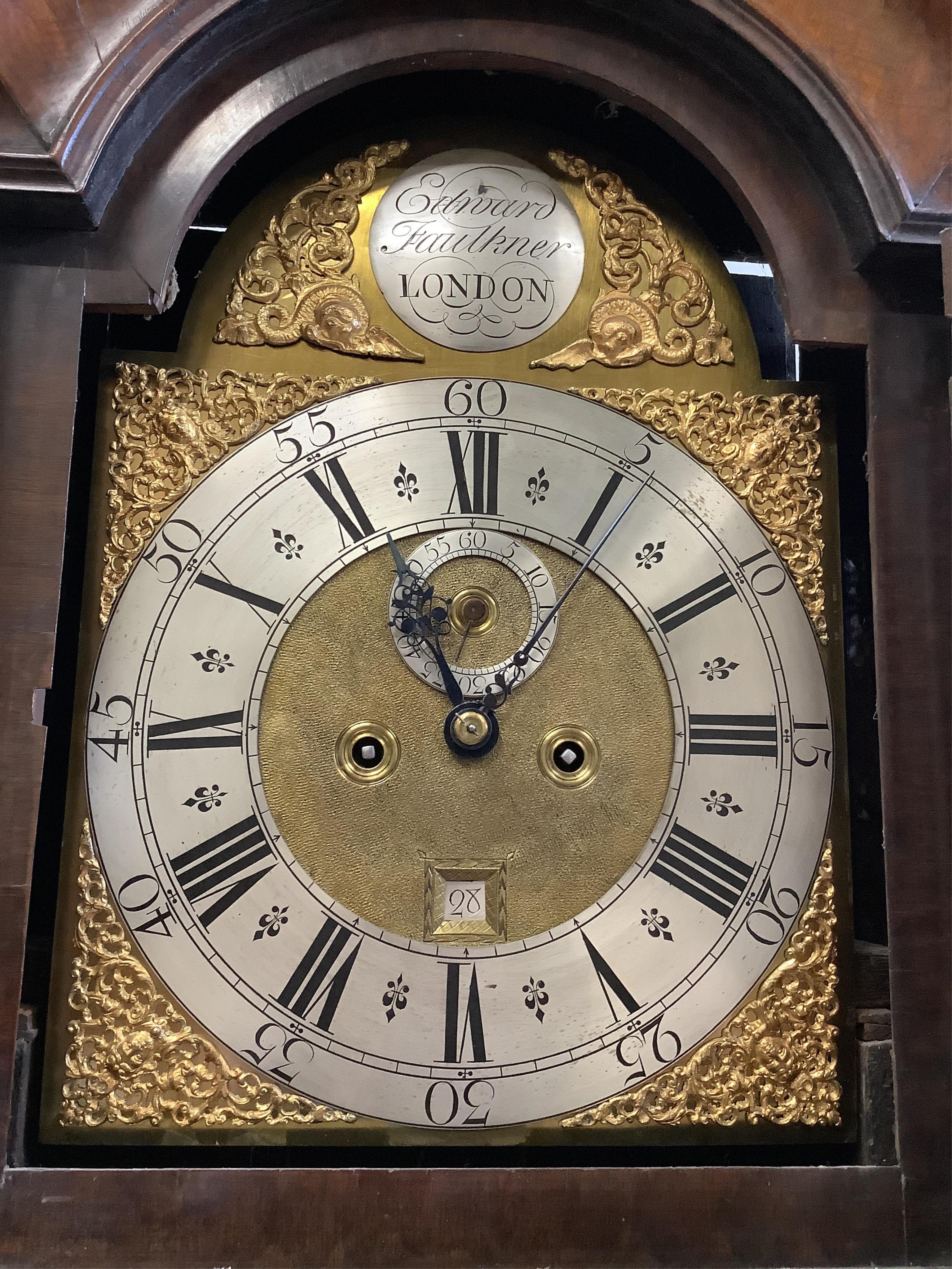 Edward Faulkner, London, a George III burr walnut cased eight day longcase clock, with an arched brass and silvered dial, height 213cm, Plinth reduced. Condition - poor